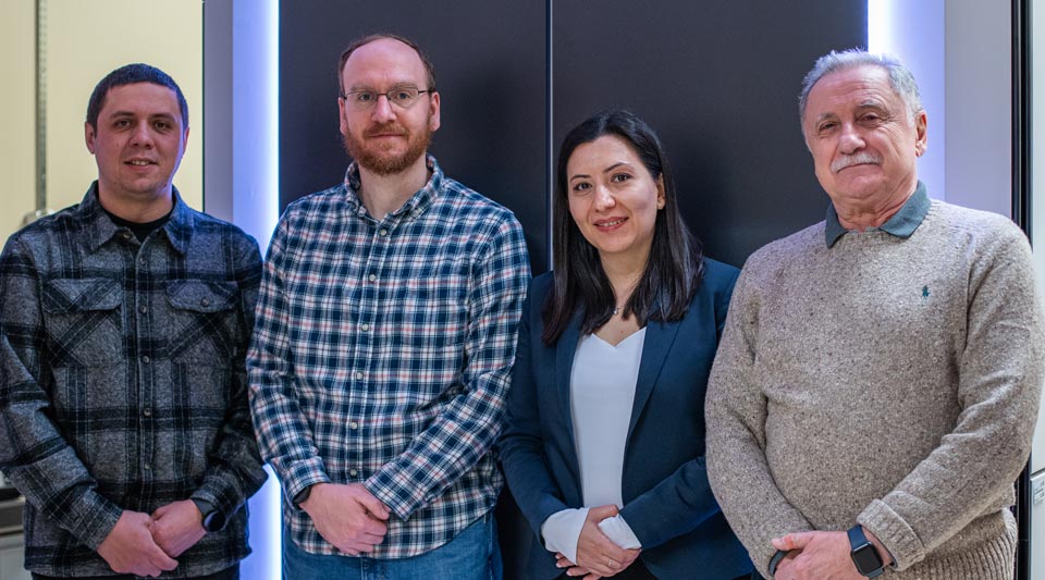 Maksym Zhukovskyi, Alex Sheardy, Astghik Kuzanyan, and Alexander Mukasyan pose during Dr. Kuzanyan's visit to Notre Dame, during which she underwent comprehensive training at the Integrated Imaging Facility. Photo: Angelic Rose Hubert